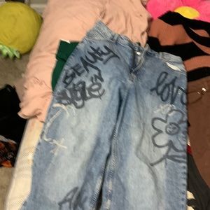 All is $60- jeans $30- purple skeleton sweater $10- purple sweater plain $20